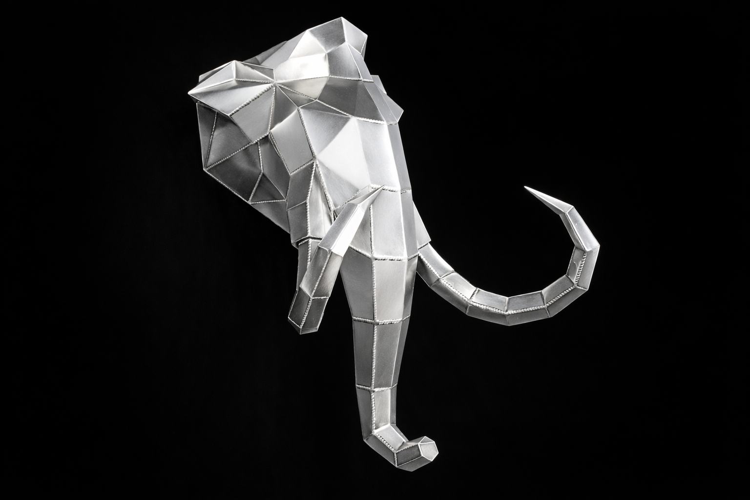 Kovová hlava - Slon (polygonální design)
